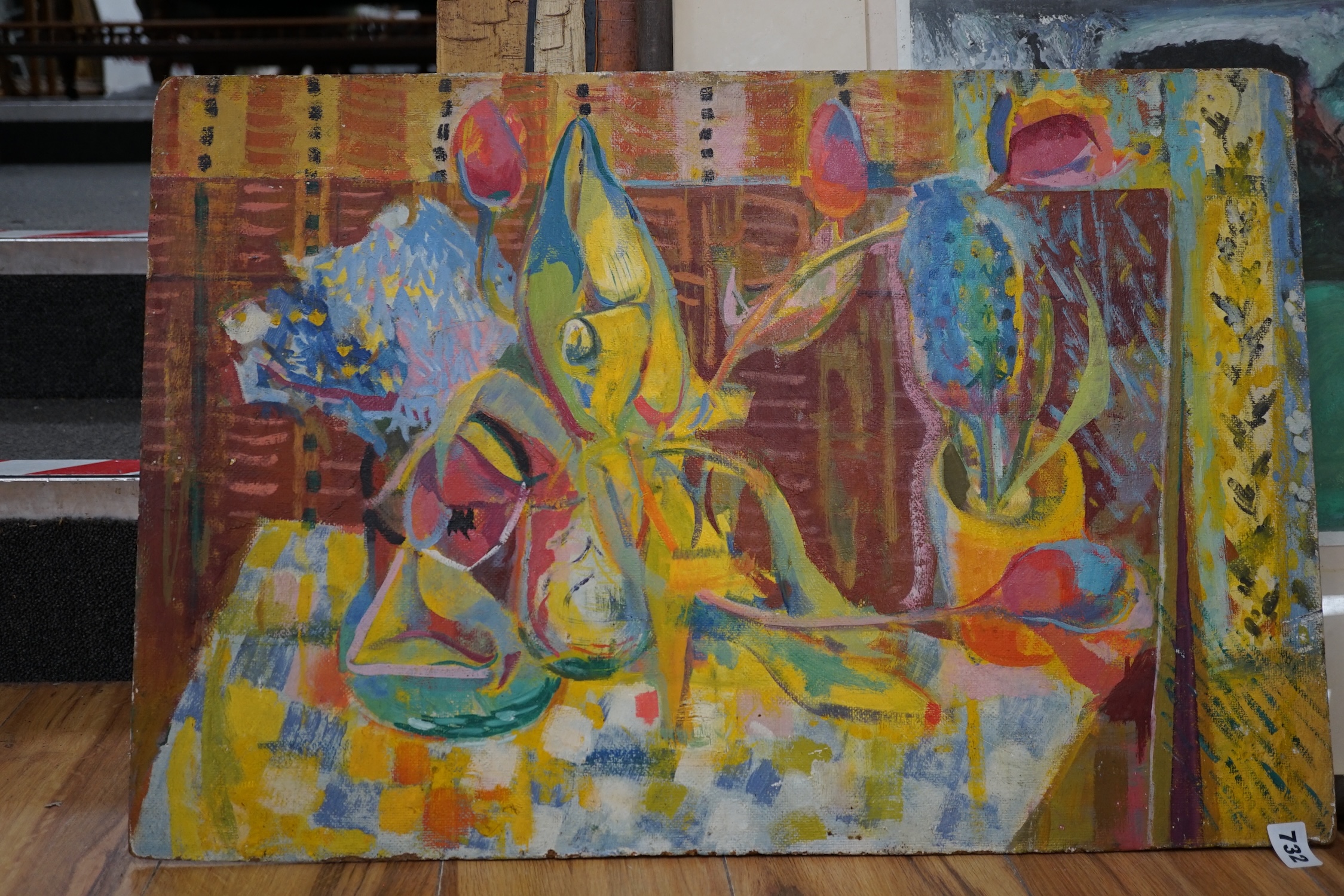 Modern British, oil on board, Still life of flowers on a table top, 46 x 69cm, unframed